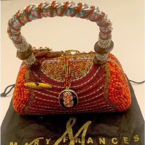 Mary Frances beaded opulent,rhinestones, studs, crystals from all over the world